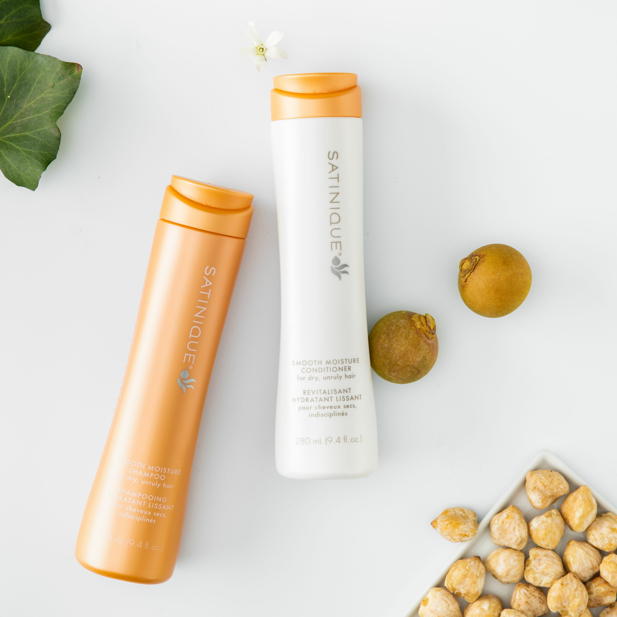 Orange Satinique Shampoo and Conditioner Bottles with ingredients