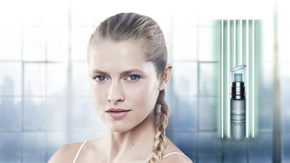 Model Teresa Palmer and a bottle of Artistry Intensive Skincare Advanced Skin Refinisher. Our Advanced Skin Refinisher has an exclusive blend of optical diffusers and natural ingredients that refines skin texture with the power of a professional fraction laser treatment (results not equivalent to surgical/cosmetic procedures).